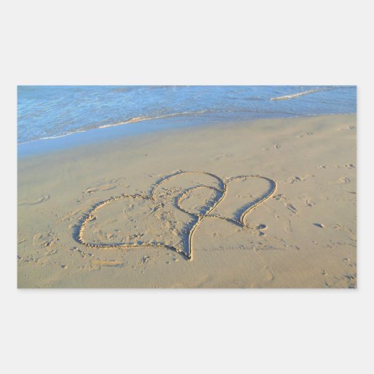 Sticker Rectangulaire Deux coeurs dans le sable de plage (Devant)