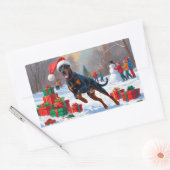 Sticker Rectangulaire Doberman coule dans la neige avec le Casquette de  (Enveloppe)