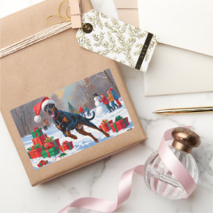 Sticker Rectangulaire Doberman courant dans la neige avec un chapeau de 