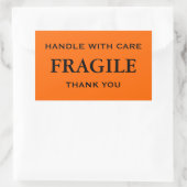 Sticker Rectangulaire Fragile orange/noir. Manipuler avec soin. Merci. (Sac)