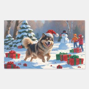 Sticker Rectangulaire Lapphund finnois courant dans la neige avec un cha