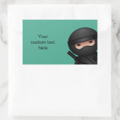 Sticker Rectangulaire Ninja qui regarde à travers un feuillage vert (Sac)