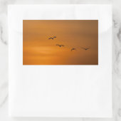 Sticker Rectangulaire Oiseaux volant au coucher du soleil (Sac)