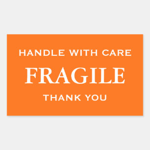 Sticker Rectangulaire Orange/Blanc Fragile. Manipulez avec soin. Merci.