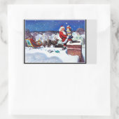 Sticker Rectangulaire Père Noël descendant la cheminée avec des livres (Sac)