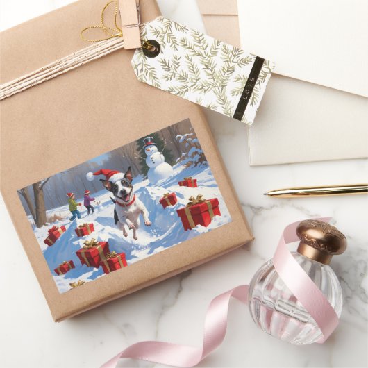 Sticker Rectangulaire Rat Terrier Courir en neige avec Casquette de Noël (Cadeaux)