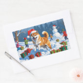Sticker Rectangulaire Shiba Inu coule en neige avec le Casquette de Noël (Enveloppe)