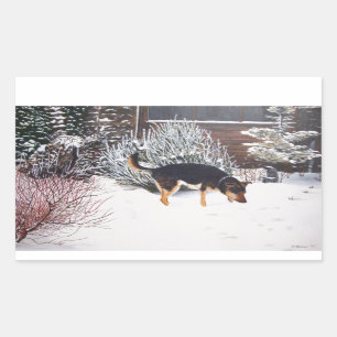 Sticker Rectangulaire Winter snow scene with cute black and tan dog