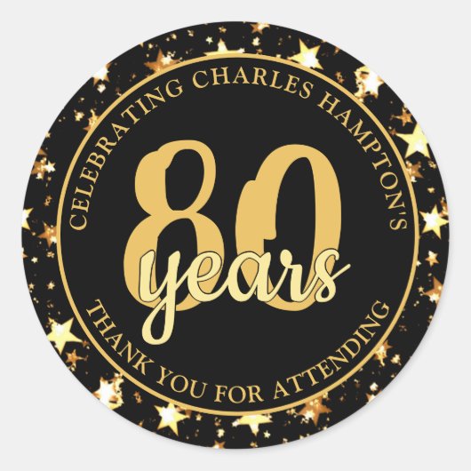 Sticker Rond 80e Anniversaire Étoiles Noires et Dorées MERCI (Devant)