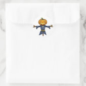 Sticker Rond A spooky Halloween scarecrow with a glowing pumpki (Sac)
