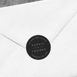 Sticker Rond Adresse de retour du Mariage noir<br><div class="desc">Cet autocollant d'adresse de retour mariage présente les noms du couple mariage et l'adresse en blanc contre une couleur noire. Consultez les éléments mariages correspondants ici https://www.zazzle.com/collections/119930609931325936 Personnalisez-le en remplaçant le texte de l'espace réservé. Pour plus d'options comme changer la police, sa taille et l'espacement entre les lettres cliquez sur...</div>