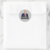 STICKER ROND ALLONS LES BÂTIMENTS DE TRUMP BRANDON (Sac)