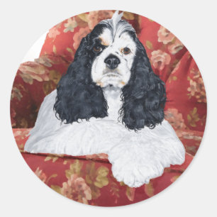 Sticker Rond American Cocker Spaniel sur Chaise Rouge