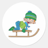 Sticker Rond Amusant Hiver Sledding Boy mignonne Snow Adventure (Devant)