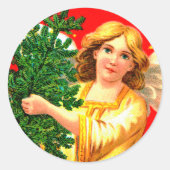 Sticker Rond Angel en Jaune portant un arbre de Noël (Devant)