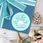 Sticker Rond Aqua Blue Seas and Greetings Christmas<br><div class="desc">This coastal Christmas sticker has the holiday message “Seas & Greetings” with a sand dollar and starfish on glitter coral,  on a light aqua blue background.
*If you would like this design on more products or need design help,  please contact me through Zazzle Chat.</div>