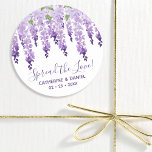 Sticker Rond Aquarelle Wisteria Mariage Étaler Le Script d'amou<br><div class="desc">Aquarelle Wisteria Mariage Spread The Love Script Favor Stickers dispose d'élégantes fleurs de glycine d'aquarelle en lavande douce et violet avec feuilles verts sur un arrière - plan blanc avec votre message de remerciement mariage et la date ci-dessous. Au contraire, il y a un lilas mou. Personnalisez en modifiant le...</div>