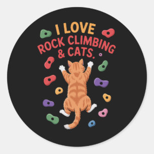 Sticker Rond Aventurier drôle de chat grimpeur de roche sur pri