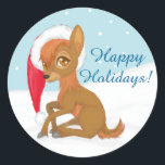 Sticker Rond Baby Christmas Reindeer<br><div class="desc">Un adorable bébé renne est assis dans la neige avec un chapeau santa ! Texte : "Joyeuses fêtes !" Personnalisez-le en cliquant sur "Customisez-le !" Badge.</div>