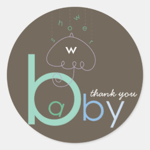 Sticker Rond Bébé 'a' dans le Baby shower des garçons de la 