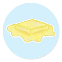Beurre qui fond sur fond bleu