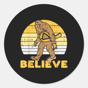Sticker Rond Bigfoot Sasquatch Croire Ruban Contre le Cancer de