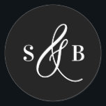 Sticker Rond Black Whimsical Calligraphy Wedding Monogram<br><div class="desc">Add a charming finishing touch to your wedding stationery or favors with this wedding sticker featuring a whimsical calligraphy ampersand. Designed with a romantic yet modern flair, this sticker is perfect for sealing envelopes, decorating favor boxes, or adding a personalized detail to welcome bags and more. The hand-drawn ampersand adds...</div>