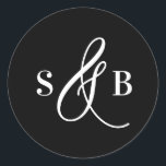 Sticker Rond Black Whimsical Calligraphy Wedding Monogram<br><div class="desc">Add a charming finishing touch to your wedding stationery or favors with this wedding sticker featuring a whimsical calligraphy ampersand. Designed with a romantic yet modern flair, this sticker is perfect for sealing envelopes, decorating favor boxes, or adding a personalized detail to welcome bags and more. The hand-drawn ampersand adds...</div>