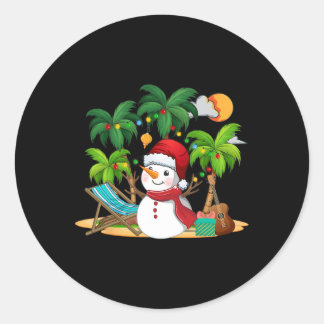 Sticker Rond Bonhomme de neige de Noël en juillet sur un palmie