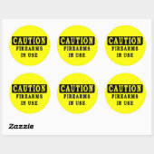 STICKER ROND BRAS DE FEU EN COURS D'UTILISATION (Feuille)