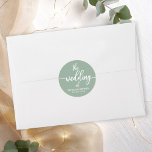 Sticker Rond Calligraphie Moderne Le Mariage De Sage Green<br><div class="desc">Préparez-vous à être fasciné par notre suite mariage de verdure à couper le souffle ! Doté d'une délicate illustration de feuilles eucalyptus et d'une calligraphie audacieuse et élégante, il s'agit d'une combinaison parfaite pour votre mariage enchanteur sur le thème du jardin. Si vous n’avez pas d’articles ou si vous avez...</div>