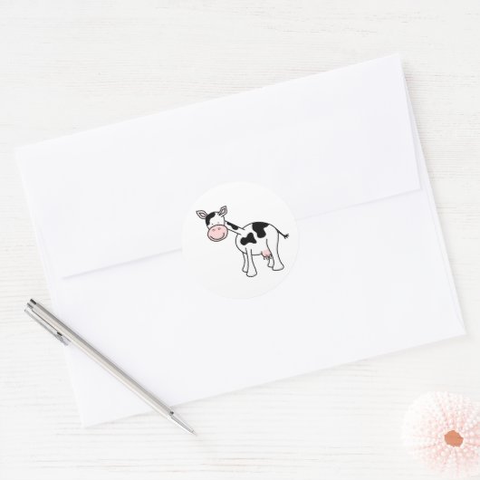 Sticker Rond Caricature de vache noire et blanche. (Enveloppe)
