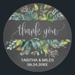 Sticker Rond Chalkboard Foliage Merci Mariage Favoriser<br><div class="desc">Ces autocollants de service de mariage sont parfaits pour un mariage rustique. Le design est composé d'un cadre de feuilles verts et de plantes botaniques verdoyantes sur un arrière - plan en damier gris fusain. Personnalisez les étiquettes autocollants avec vos noms, l'événement (le cas échéant) et la date. Ces autocollants...</div>