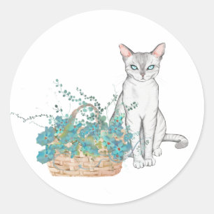 Sticker Rond Chat blanc élégant avec panier de fleurs bleues