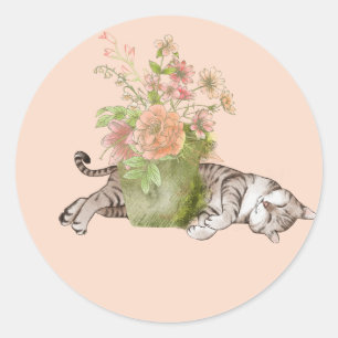 Sticker Rond Chat endormi dans le jardin rose et vert