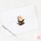 Sticker Rond Chat flottant dans l'espace lisant un livre de con (Enveloppe)
