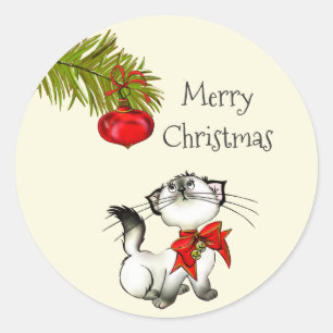 Sticker Rond Chat Kitty En Jeu Dans Une Bow De Noël Rouge