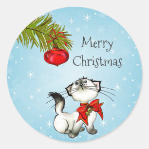 Sticker Rond Chat Kitty En Jeu Dans Une Bow De Noël Rouge