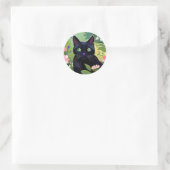 Sticker Rond Chat noir assis dans un champ de fleurs (Sac)