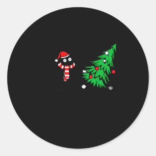Sticker Rond Chat noir drôle poussant l'arbre de Noël sur le ch