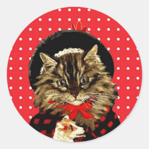 Sticker Rond Chat vintage de Noël tenant l'autocollant de chie