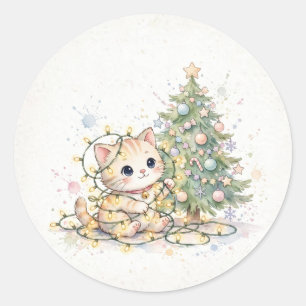 Sticker Rond Chaton emmêlé dans les lumières de Noël