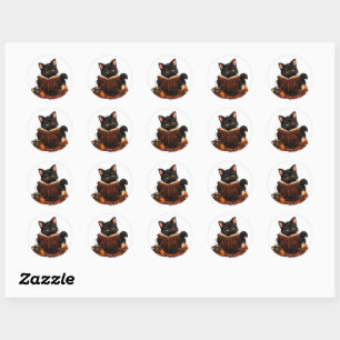 Sticker Rond Chatte noire ensorceleuse et cosy lisant un livre