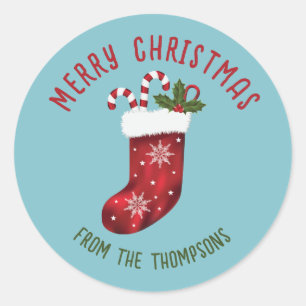 Sticker Rond Chaussette de Noël rouge sur fond bleu avec texte