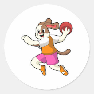 Sticker Rond Chien à Handball joueur avec Handball