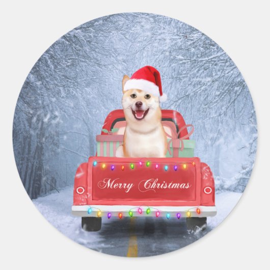 Sticker Rond Chien de Shiba Inu en neige assis sur un camion de (Devant)