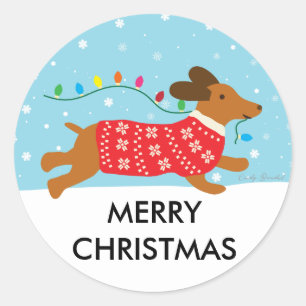 Sticker Rond Chien de teckel dans le Joyeux Noël de neige