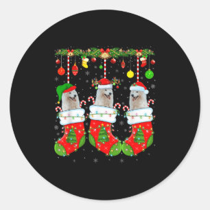 Sticker Rond Chien Esquimau Américain en chaussettes de Noël Ch