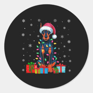 Sticker Rond Chien Moche Noël éclaire Père Noël Doberman Pinsch