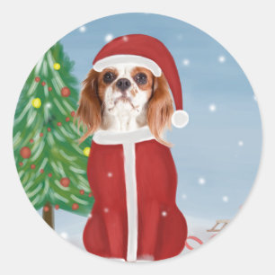 Sticker Rond Chien roi Cavalier en neige avec cadeaux de Noël